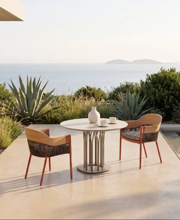 The KENDA chair highlights enveloping shapes and is characterized by the combined use of wood, rope, and aluminum. This chair evokes refined handicraft techniques that evolve into a modern, practical, and functional object. The KENDA chair represents a perfect fusion of tradition and modernity, as well as technology and craftsmanship.
