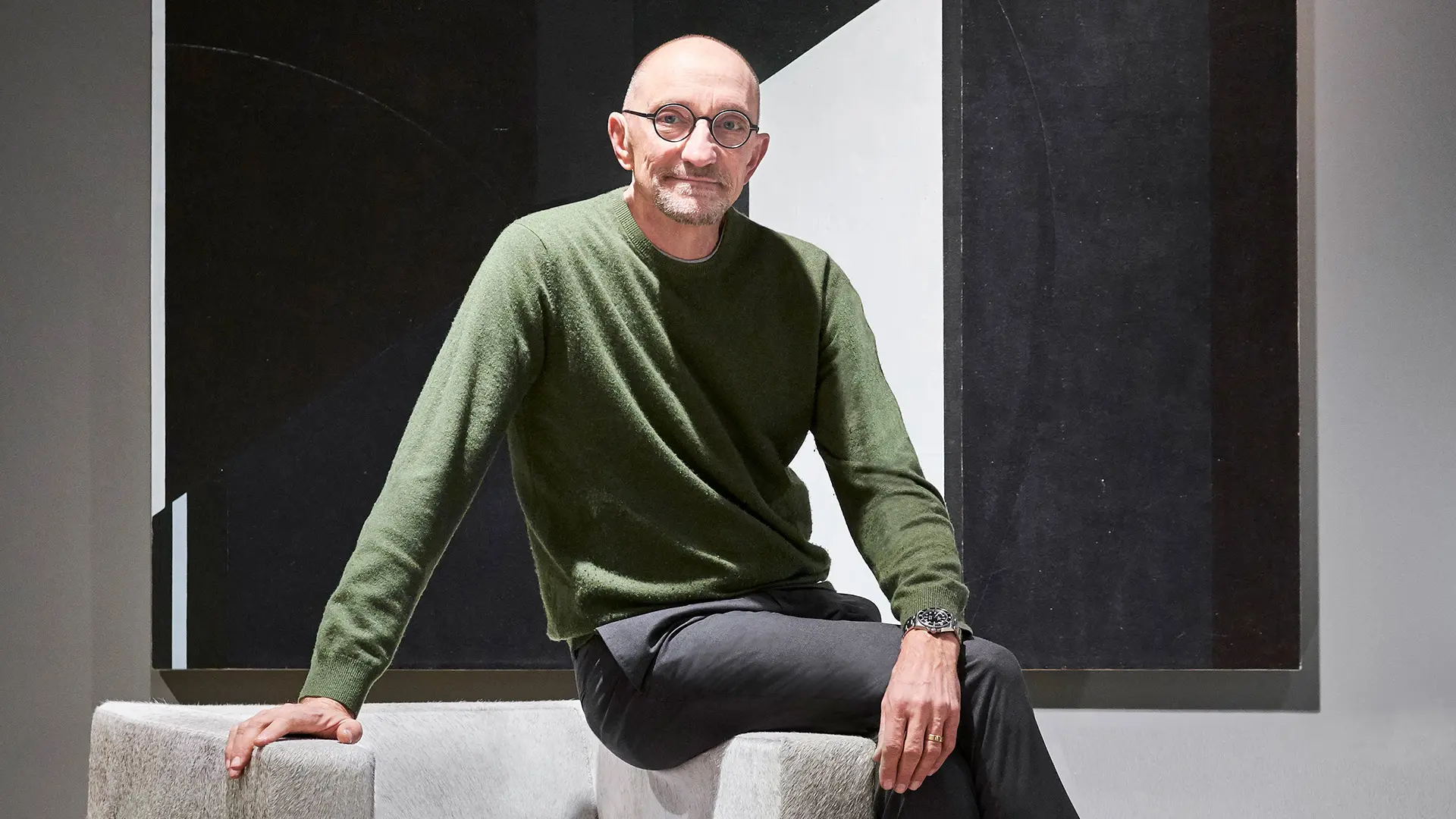 Rodolfo Dordoni with Suitcase armchair, Minotti. Photo courtesy