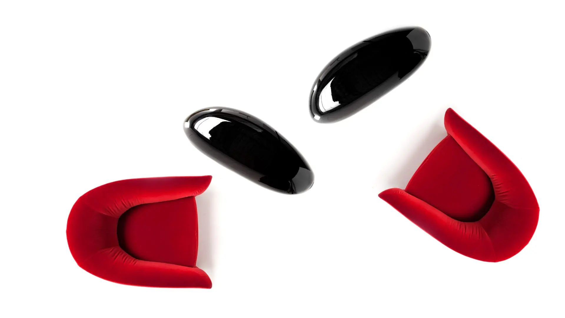 Red Canzone armchairs and Invece tables